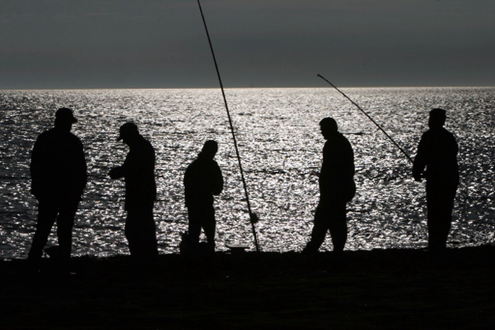 Рыбаки на берегу Каспийского моря. ©РИА НОВОСТИ