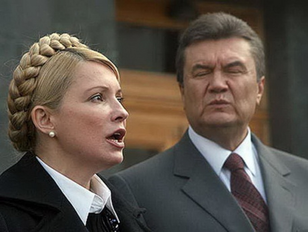 Юлия Тимошенко и Виктор Янукович. Фото из архива Tengrinews.kz