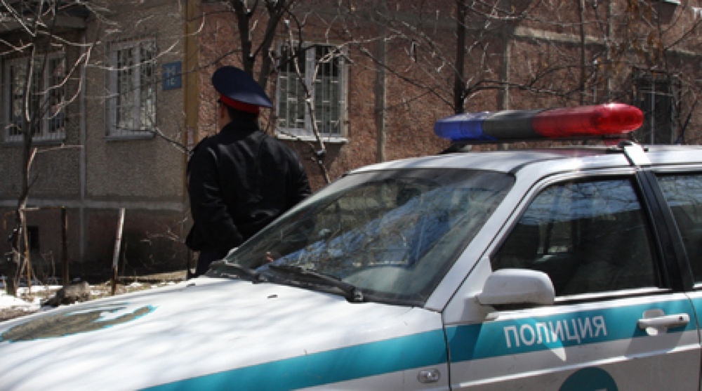 Полицейский в оцеплении. Фото ©Роза Есенкулова