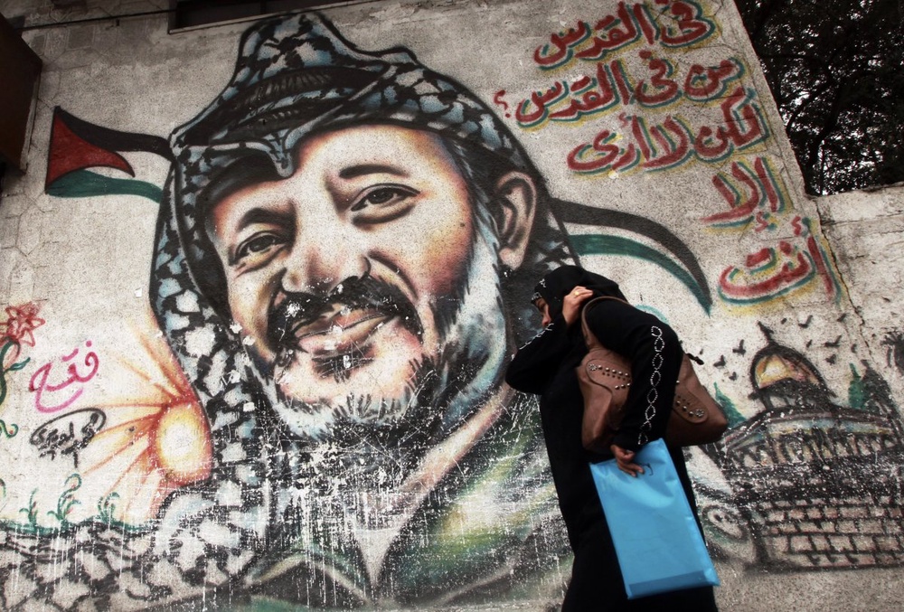 Граффити с изображением Ясира Арафата. Фото REUTERS/Suhaib Salem©
