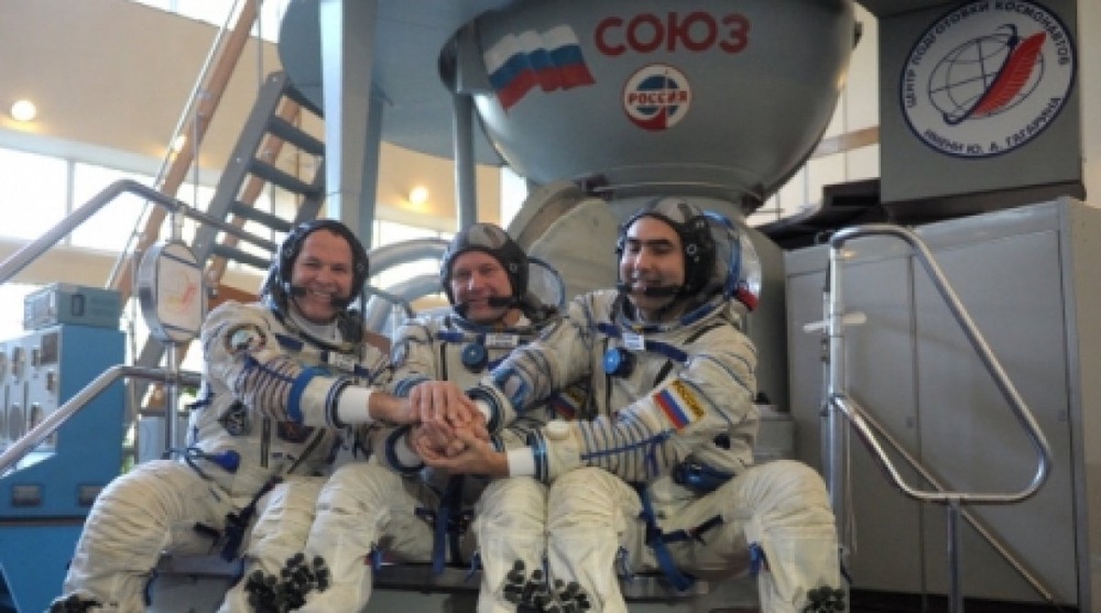 Основной экипаж МКС-33/34 Кевин Форд, Олег Новицкий и Евгений Тарелкин. Фото ©РИА Новости