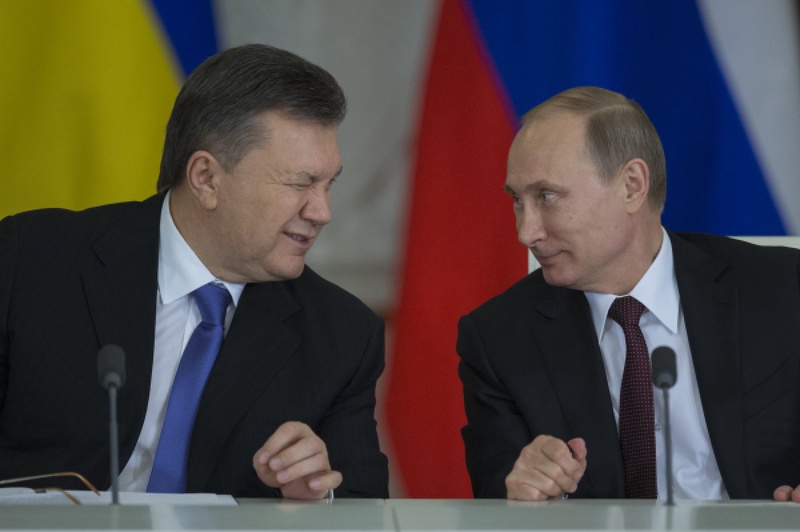 Виктор Янукович и Владимир Путин на заседании российско-украинской межгосударственной комиссии в Кремле 17 декабря 2013 года. Фото ©РИА Новости