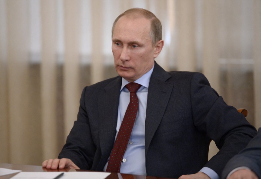 Президент России Владимир Путин во время встречи с членами Совета палаты Совета Федерации. ©РИА Новости