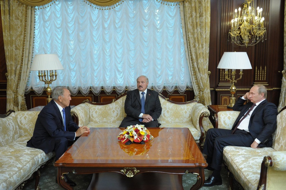 Нурсултан Назарбаев, Александр Лукашенко и Владимир Путин на встрече в Минске 26 августа 2014 года. Фото © REUTERS