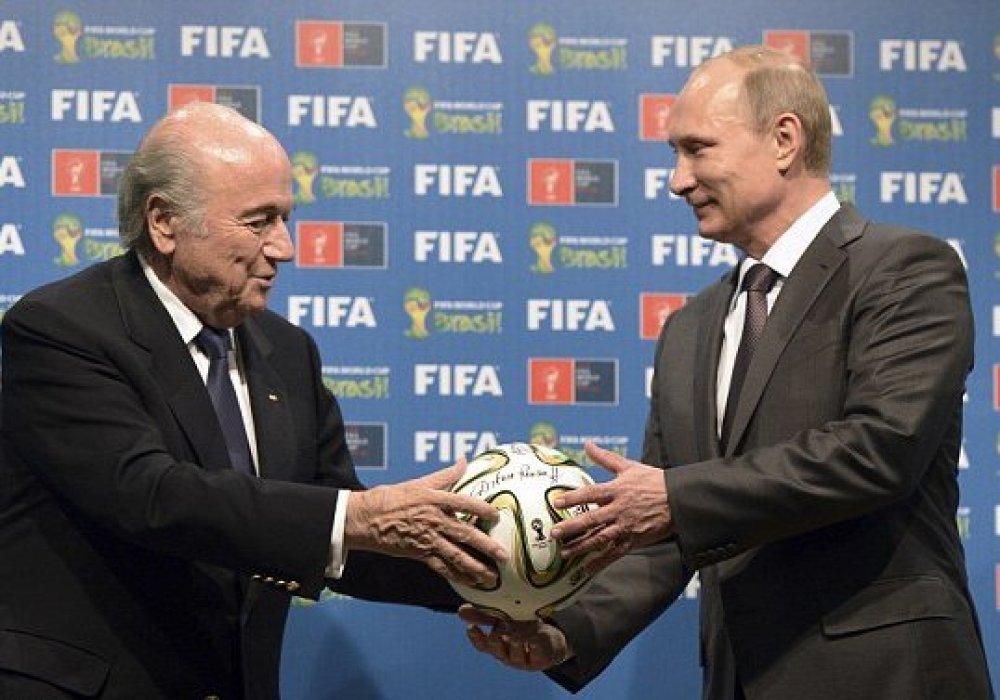 Президент ФИФА Йозеф Блаттер и Владимир Путин. © Reuters