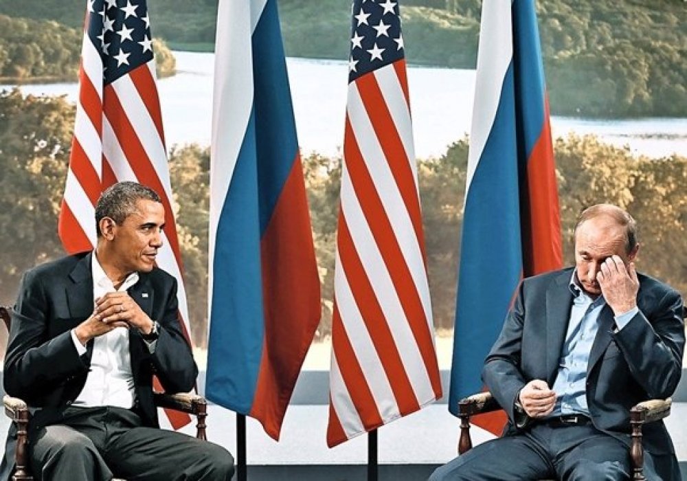 Барак Обама и Владимир Путин на саммите G8 в Северной Ирландии в 2013 году. © Kevin Lamarque/Reuters