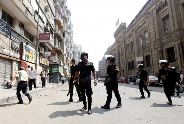 Полиция в центре Каира 13 августа 2013 года. Фото ©REUTERS