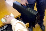 В Астане финансовые полицейские арестовали своего "коллегу"