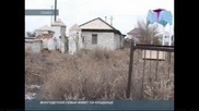 В Семее женщина с 7 детьми живет на кладбище