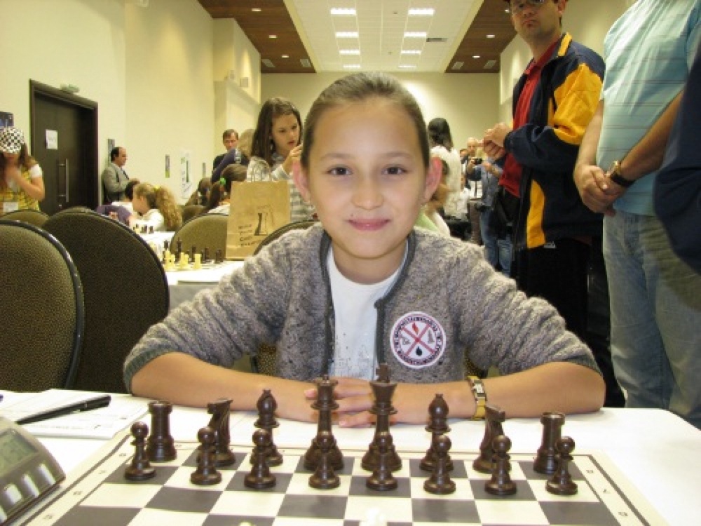 Казахстанская шахматистка, трехкратная чемпионка мира, 11-летняя Жансая Абдумалик. Фото с сайта todase.kz