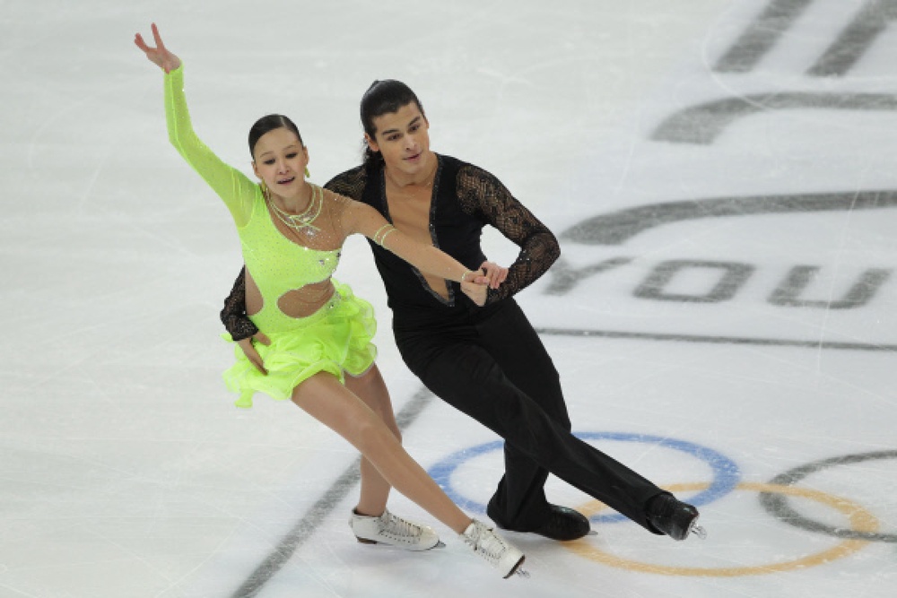Карина Узурова и Ильяс Али выступают на Первых зимних юношеских Олимпийских играх. Фото ©РИА НОВОСТИ