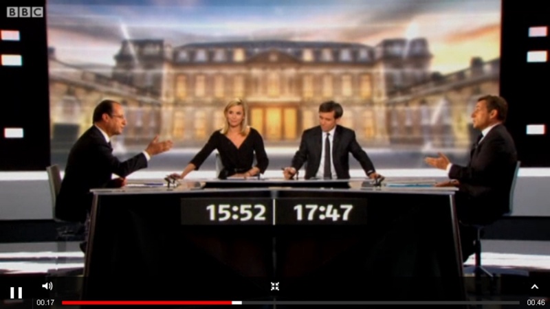 Теледебаты с участием Франсуа Олланда (крайний слева) и Николя Саркози (крайний справа). Кадр BBC News