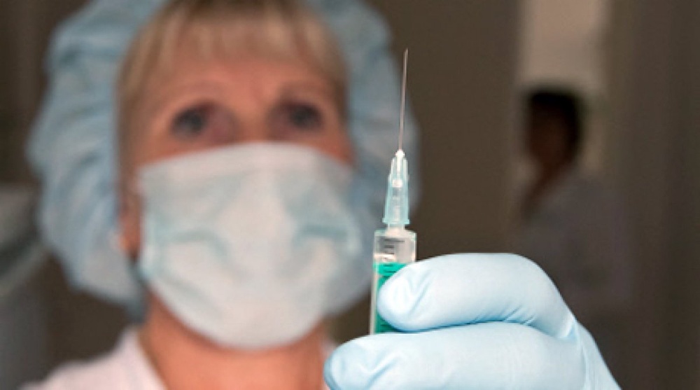 Единственно эффективным способом защиты от кори и краснухи является вакцинация. Фото ©РИА Новости