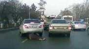 Девушку протащили по асфальту под автомобилем в Алматы