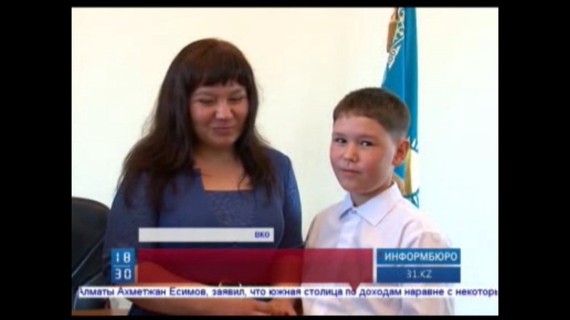 Никита Коломысов с мамой. Кадр "31 канала"