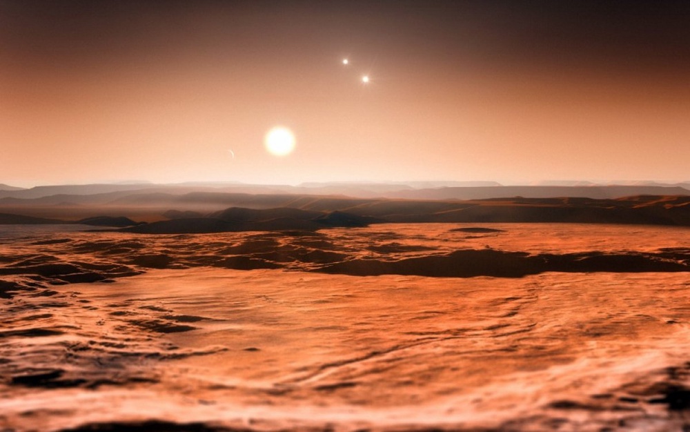 Примерно так выглядел бы закат в системе из трех планет в созвездии Скорпиона. Фото с сайта bbc.co.uk