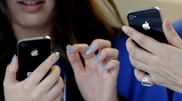 Китаянку убило током во время разговора по iPhone