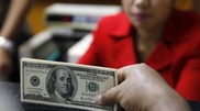 Курс тенге к доллару вырастет из-за решения ФРС США
