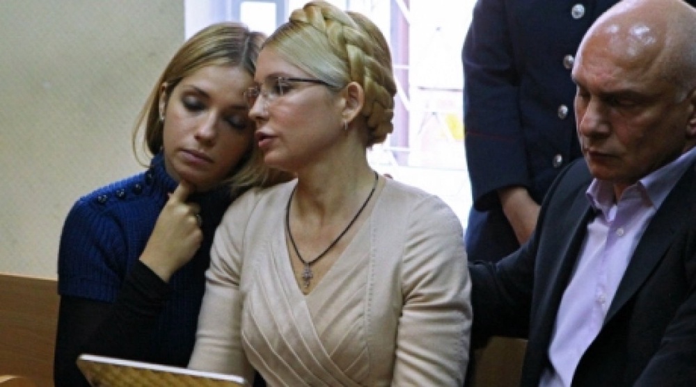 Юлия Тимошенко (в центре) с дочерью Евгенией и супругом Александром. Фото ©РИА Новости, архив
