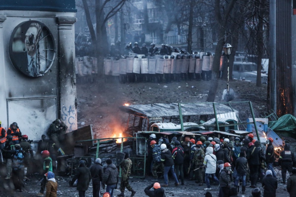 Протестующие во время столкновений с сотрудниками правоохранительных органов в Киеве. Фото ©РИА Новости