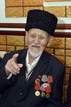 100-летний житель Атырау сохраняет осанку благодаря шубату