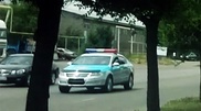 Полицейский автомобиль без переднего номера ездил в Алматы