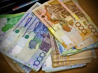 Курс доллара к тенге может достигнуть отметки в 185 - эксперт