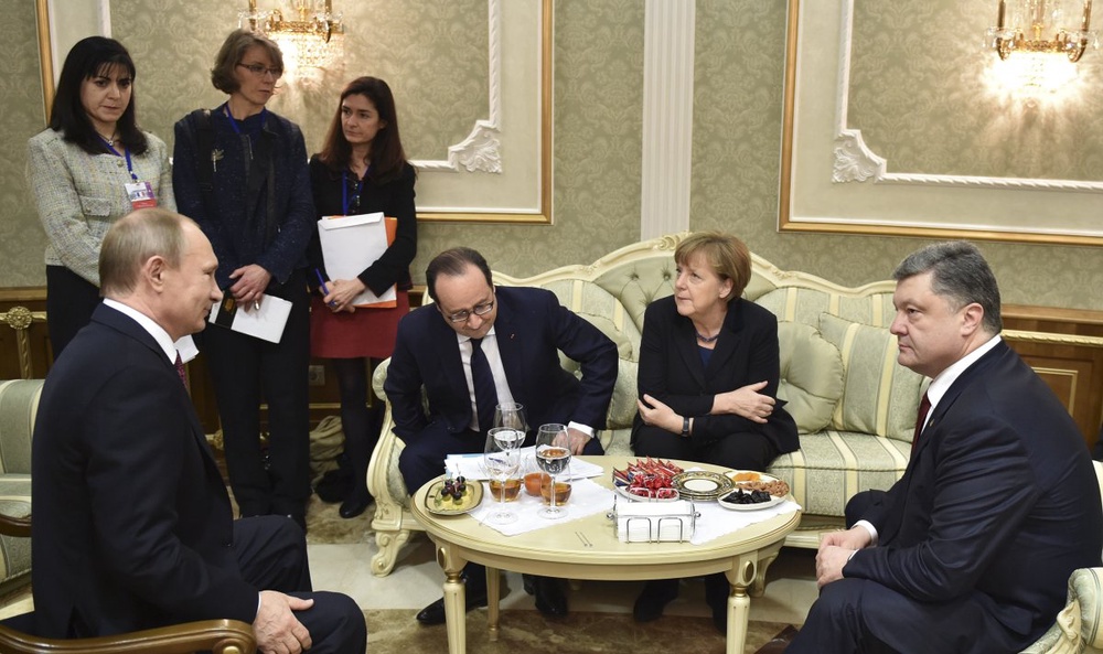  Владимир Путин, Франсуа Олланд, Ангела Меркель и Петр Порошенко во время переговоров "нормандской четверки". Фото ©REUTERS
