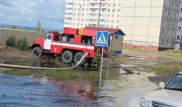 После аномальных ливней в Астане в усиленном режиме откачивают воду