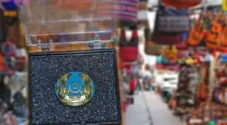 Запретить продавать госсимволы на базарах хотят в РК