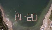 Около тысячи человек построили лого BI Group на воде в честь юбилея