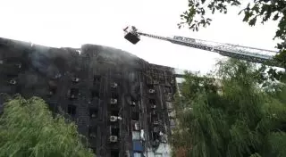 Пожар в административном здании в Таразе: Люди прыгали из окон