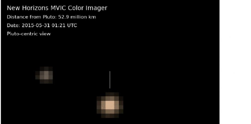 Плутон и вращающийся вокруг него Харон. ©NASA