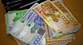 Курс тенге к доллару может достигнуть 192 тенге к концу 2015 года - аналитики