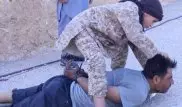 Мальчик из ИГ (ДАИШ) обезглавил сирийского солдата
