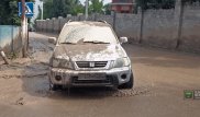 Сель в Алматы помог заработать автомойщикам