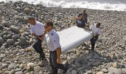 Эксперты приступили к изучению обломков пропавшего малайзийского самолета