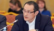 Падение курса тенге не было случайным - эксперт Halyk Finance
