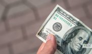 Средневзвешенный курс доллара на утренних торгах KASE составил 234,94 тенге