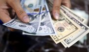 Курс доллара поднялся до 238 тенге на дневной сессии