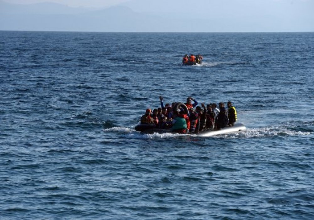 Фото РИА Новости© Беженцы из Сирии, Ирака, Эритреи, прибывающие к острову Лесбос в Греции.