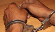 Двоих полицейских задержали за вымогательство взятки в Астане