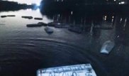 Российские заемщики спустили в Москву-реку 20 гробов с названиями банков