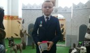Медалью "За мужество" награжден 11-летний алматинец, спасший троих детей из горящего дома