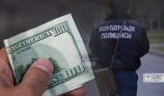 Двух полицейских в Астане оштрафовали на 5,2 миллиона тенге за взятку в 100 долларов