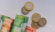Курс тенге снизился до 334,61 за доллар