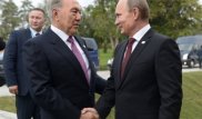Старые газеты подарил Назарбаеву Путин