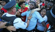 Митингующие в Чикаго требуют ареста полицейских