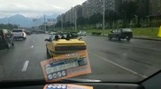 Ливень застал врасплох пассажиров кабриолета в Алматы