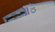Сельский аким задержан в Алматинской области за взятку при выдаче земли под ИЖС
